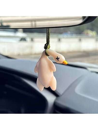 1 con vịt quay trang trí đổi màu theo ánh nắng mặt trời, có thể treo trên gương chiếu hậu hoặc túi xách, vật trang trí vui nhộn và thú vị, giúp thư giãn khi lái xe, quà tặng ngày lễ.