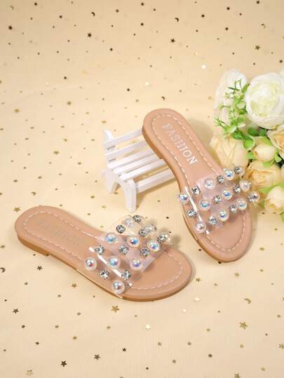 一双女童透明凉鞋，饰有彩色水钻，平底防滑，适合日常玩耍和夏季派对。