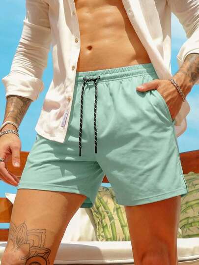 2026 Nuevos shorts de playa verde menta para hombres, shorts deportivos casuales de verano para la playa y natación, a juego en pareja, adecuados para nadar, vacaciones