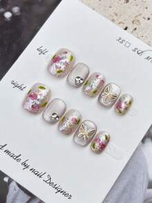 10 Stücke handgefertigte ovale Kunstnägel pro Set, mit silbernem Stern-Katzenaugen-Design und dekoriert mit silbernen Stern-Pailletten, inklusive Werkzeug. Es kann als Geschenkset für Frauen zu Feiertagen gegeben werden und ist für den täglichen Gebrauch durch Frauen jeden Stils geeignet. - Verschiedenfarbig - Übersicht 3