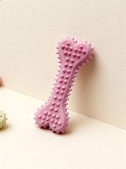 PETSIN Ta zabawka jest odpowiednia dla małych psów i szczeniąt do żucia i ząbkowania. Wykonana jest z tworzywa TPR i ma kształt gryzaka dla psów. Zabawka nadaje się do przechowywania jedzenia i jest wykonana z tworzywa TPR. Może służyć jako piłka do ćwiczeń relaksacyjnych i treningowych dla małych psów, a także jako produkt dla zwierząt domowych.