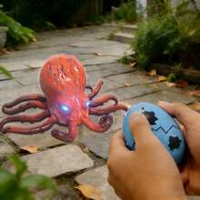 Remote-Controlled Crawling Octopus Toy, With Light-Up Eyes, Rotating And Swinging Claws, And A Realistic Electric Motor Toy. The Perfect Companion Gift And Birthday Present. - Red - View 5