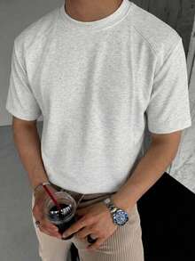 1 Áo thun nam trơn màu chất lượng cao, thân thiện với da, thoáng khí, cổ tròn, tay ngắn, kiểu dáng cổ điển giản dị, có thể giặt máy, phù hợp cho đi làm hàng ngày và các hoạt động ngoài trời. - Màu Xám nhạt - Xem 2