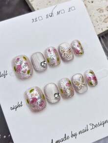 10 Stücke handgefertigte ovale Kunstnägel pro Set, mit silbernem Stern-Katzenaugen-Design und dekoriert mit silbernen Stern-Pailletten, inklusive Werkzeug. Es kann als Geschenkset für Frauen zu Feiertagen gegeben werden und ist für den täglichen Gebrauch durch Frauen jeden Stils geeignet. - Verschiedenfarbig - Übersicht 2
