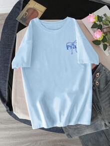 Áo thun oversized in hình "Pray" dành cho bé gái - In hình phía sau với điểm nhấn nơ và khẩu hiệu truyền cảm hứng - Áo thun thường ngày thoải mái cho mùa tựu trường và tụ tập bạn bè. - Màu xanh nhạt - Xem 2