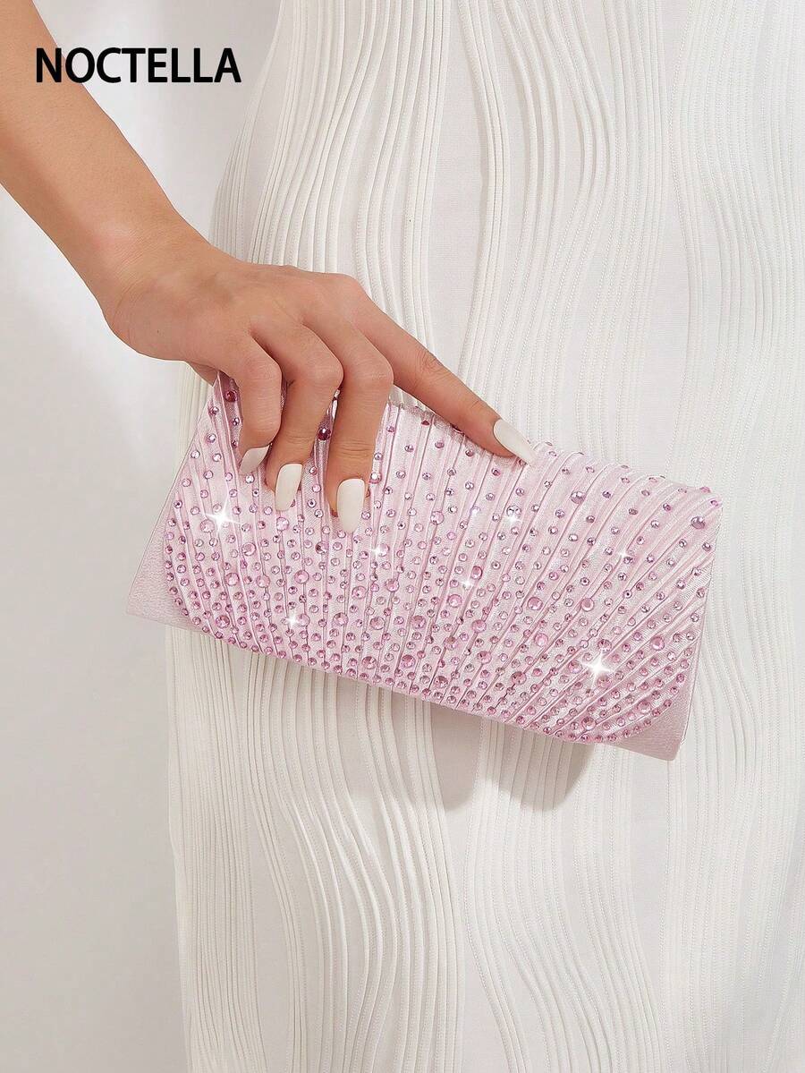 Noctella 这款闪亮的粉色手拿包饰有水晶，采用优雅的褶皱设计和闪亮的水晶点缀，是正式场合、派对和约会的理想之选。也是送给女性的完美礼物。 - 粉色 - 查看 1