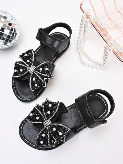 Sandal đế bằng chống trượt đính sequin và nơ bóng bẩy mới năm 2026 dành cho bé gái, thích hợp cho các chuyến đi chơi cuối tuần cùng gia đình, tiệc trà của chị em gái, các hoạt động ở trường mẫu giáo.