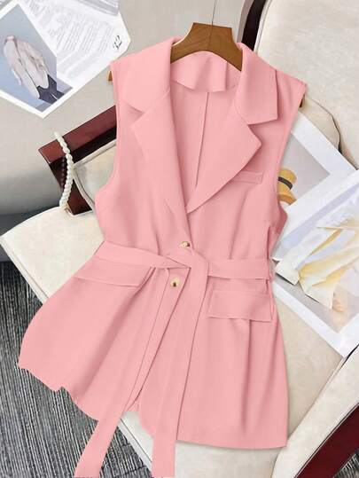 سترة بلا أكمام وردية اللون للمرأة البدينة مع حزام وجيوب