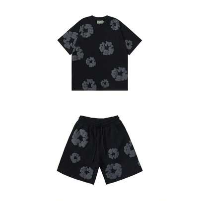 Nuevo conjunto de estilo americano para hombre: camiseta de manga corta con estampado floral y pantalones cortos.Dos piezas de corte holgado, cómodas y con estilo urbano.