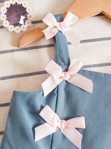 Đầm hai dây xếp ly nhiều lớp cho bé gái, trang trí nơ xinh xắn, kiểu dáng công chúa ngọt ngào và cá tính, phù hợp cho tiệc sinh nhật, trình diễn thời trang và mặc hàng ngày. - Xám - Xem 4