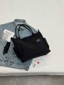 字母贴布装饰轻便购物袋，多口袋休闲手提包，斜挎书包，大容量单肩包，适合上班族、毕业生、青少年、大学生和高中生，是工作、商务通勤、户外旅行和返校的理想之选。 - 黑色 - 查看 7