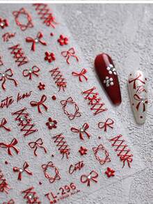 一款红色金属蝴蝶结美甲贴纸，一款蕾丝罗纹自粘美甲贴，一款可以在家DIY的美甲装饰配件。美甲贴纸 - 紅色 - 查看 4