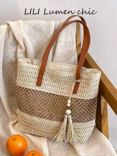 This New Stylish Resort-Inspired Beach Tote Bag Is A Lightweight, Hand-Woven Straw Shoulder Bag Adorned With Contrasting Stripes And Tassels. Featuring A Zip Closure, This Casual Woven Tote Bag Is The Perfect Choice For A Vacation.