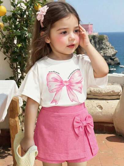 Baby Girls Valentine's Day New Arrival Letter & Big Bow Print Short Sleeve Round Neck Top + 3D Bow Decor Skort Set, Summer