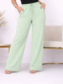 Wide-Leg, Loose-Fitting, High-Waisted Pants In Duna Fabric With Elastic Waistband And Pockets. - Apple Green - View 1