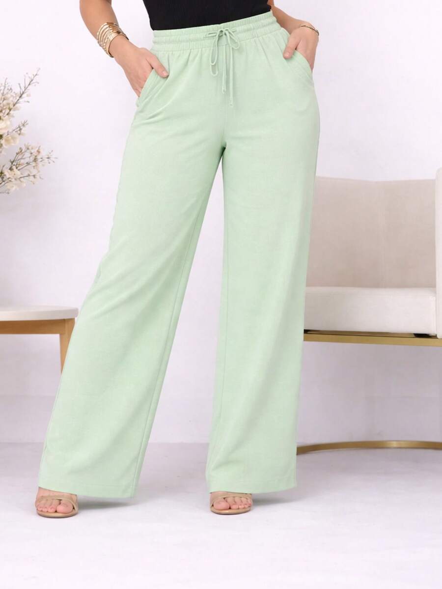 Wide-Leg, Loose-Fitting, High-Waisted Pants In Duna Fabric With Elastic Waistband And Pockets. - Apple Green - View 1