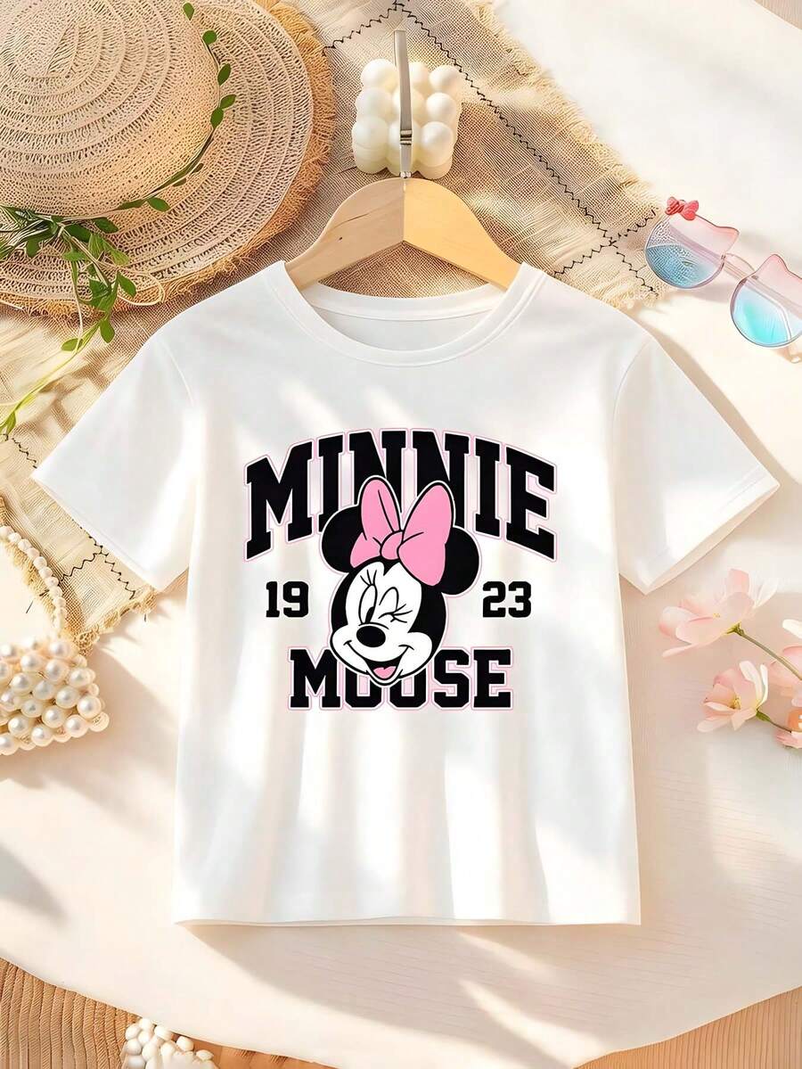 Disney-Themed T-Shirt For Girls Featuring Minnie Mouse Lettering And Cartoon Graphics. This Soft, Breathable Short-Sleeve Crew Neck Tee Is Perfect For Spring And Summer Wear, Ideal For Everyday Outfits, Vacation Leisure, Outdoor Adventures, School Life, And Shopping Trips. It Also Makes An Excellent Gift For Boys And Girls Alike. Every Child Deserves One. - trắng - Xem 1