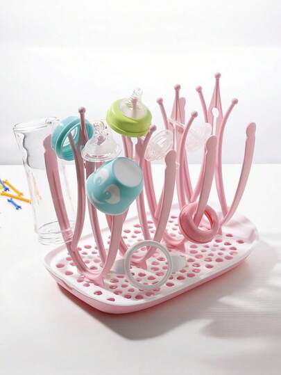 1个可拆卸多功能瓶沥水架，材质：PP，轻便易携，可用于沥干瓶子/杯子/盘子/碗碟、筷子等。适用于家庭/厨房/浴室/婴儿房/办公室。现代简约风格，可拆卸底座设计，配有可拆卸瓶刷，易于清洁，易于收纳。带有挂钩和托盘，也可作为桌面收纳板使用。