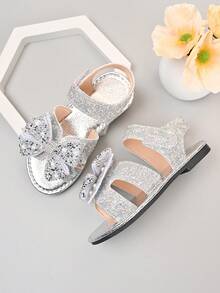 Sandal đế bằng chống trượt đính sequin và nơ bóng bẩy mới năm 2026 dành cho bé gái, thích hợp cho các chuyến đi chơi cuối tuần cùng gia đình, tiệc trà của chị em gái, các hoạt động ở trường mẫu giáo. - Bạc - Xem 6