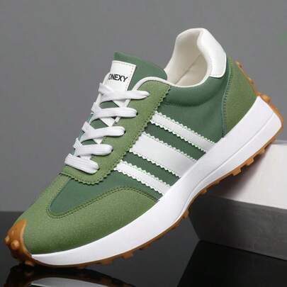 男士运动训练鞋，条纹设计，抓地力极佳。有黑色、白色和绿色可选。适合所有季节。尤其适合徒步和跑步等运动。