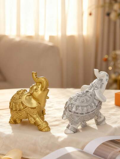 1 pieza Estatua de elefante dorado para decoración del hogar - Exquisito adorno de latón con simbolismo auspicioso, perfecto para la sala de estar, la mesa de café, la oficina y el regalo de Feng Shui, adecuado para la decoración de la habitación, la decoración del hogar, la decoración de cumpleaños, la cocina, la boda, la decoración del dormitorio, la decoración de la sala de estar, regalos, la decoración de la fiesta.