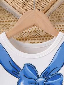 Conjunto de 2 piezas de camiseta de manga corta con cuello redondo y decoración de lazo azul, y falda mini elegante para niñas, de moda para uso al aire estilo escolar, verano - Azul - Ver 3