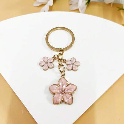 1 pièce Porte-clés fleur de cerisier, décoration de breloque de téléphone minimaliste avec fleur de cerisier, convient pour les femmes/filles, la Saint-Valentin, les accessoires de voiture, le pendentif de sac, style gothique mignon, cadeau de l'Aïd el-Fitr, cadeau du Ramadan, cadeau de la Saint-Valentin pour le petit ami