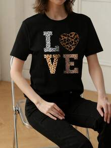 Camiseta de cuello redondo y mangas cortas de ropa fashion, fabricada en México, para la temporada primavera-verano 2025. Con estampado de dibujos animados, es un modelo de pareja - Negro - Ver 3