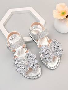 Sandal đế bằng chống trượt đính sequin và nơ bóng bẩy mới năm 2026 dành cho bé gái, thích hợp cho các chuyến đi chơi cuối tuần cùng gia đình, tiệc trà của chị em gái, các hoạt động ở trường mẫu giáo. - Bạc - Xem 3