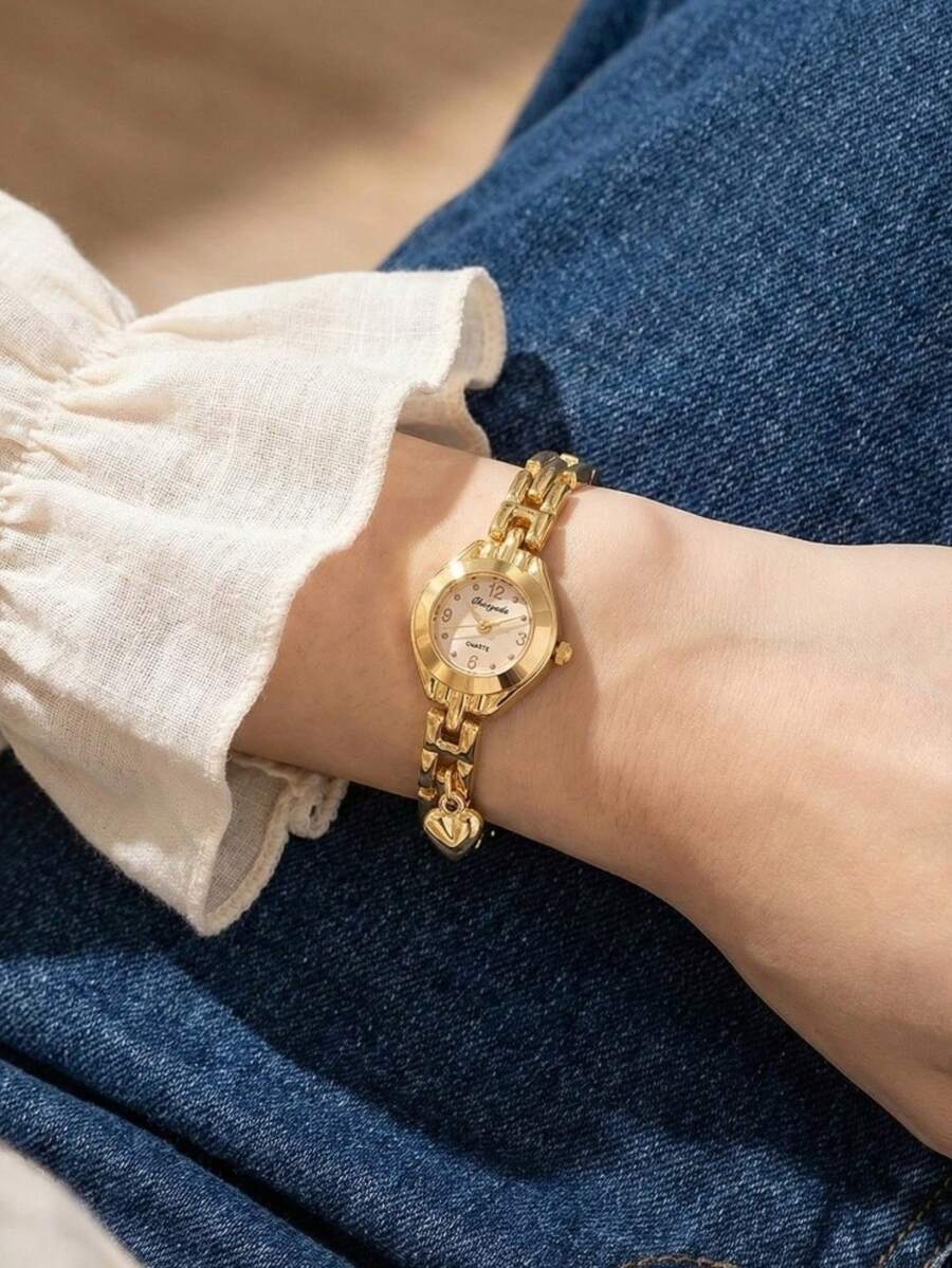 这款女士奢华金色合金表带石英腕表，适合正式场合佩戴。是母亲节、情人节或结婚纪念日送给妻子或女友的理想礼物。这款优雅的女士腕表非常适合出席晚宴、婚礼和时装秀等正式活动。也是腕表爱好者的完美之选。