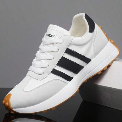 Men's Athletic Training Shoes, Featuring Striped Design. Excellent Traction. Available In Black, White And Green Colors. Suitable For All Seasons. Especially Ideal For Hiking And Running Activities.