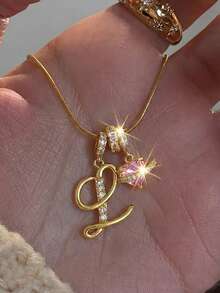 1 chiếc dây chuyền mặt dây chuyền hình trái tim đính đá Cubic Zirconia màu hồng dễ thương, kiểu dáng tối giản, có thể khắc chữ theo yêu cầu, thích hợp cho nữ giới đeo hàng ngày, làm quà tặng Ngày Valentine/Sinh nhật. - Vàng - Xem 3