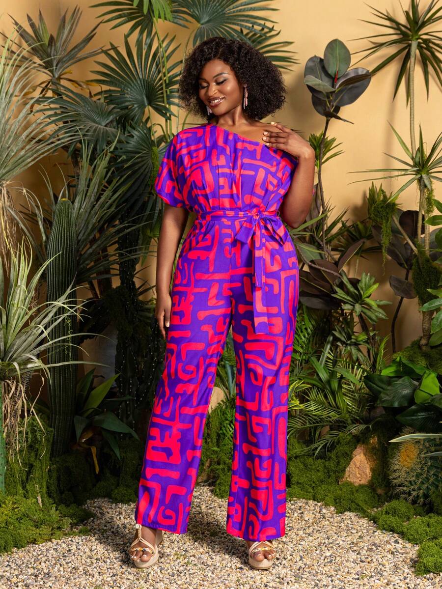 Faeriesty Eleganter Jumpsuit in Große Größen: Weites Bein Jumpsuit mit drapiertem Stehkragen Design, durchgängiger künstlerischer Grafikdruck, Taillen-Bindung - ideal als Outfit für Hochzeitsgäste, Outdoor Braut-Fotoshootings, romantische Garten-Porträts, tropische Zeremonien, Boho-Chic Mode-Redaktions-Urlaubs-Sommer - Rot-violett - Übersicht 1