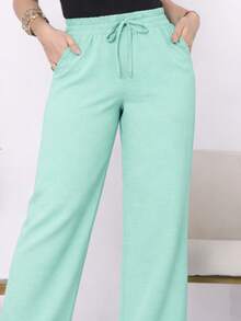 Wide-Leg, Loose-Fitting, High-Waisted Pants In Duna Fabric With Elastic Waistband And Pockets. - Water Green - View 2