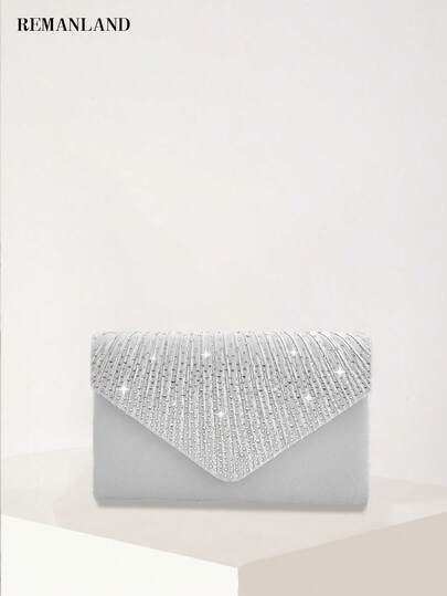 REMANLAND 这款闪亮的银色信封手拿包饰有水钻，采用璀璨夺目的全水晶翻盖和简约设计，是晚宴、盛大派对和浪漫约会的完美之选。它是送给女性的最佳礼物。