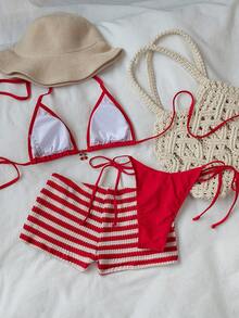 Sultry Sol Bộ bikini đi biển 3 món mùa xuân/hè 2026 dành cho nữ, kiểu dáng thời trang, gợi cảm, màu trơn với họa tiết trái cây kim loại, áo bikini buộc dây qua lưng hở, kết hợp với quần short sọc móc kiểu bohemian, thích hợp cho ngày Valentine, tiệc bể bơi và kỳ nghỉ biển. - Đỏ và trắng - Xem 4