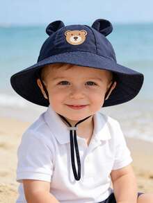 1 chiếc mũ chống nắng tai gấu dễ thương cho bé từ 3-12 tháng tuổi, có miếng vá hình gấu, dây đeo cằm điều chỉnh được, vành rộng, chống tia UV. - Mũ ngư dân hình gấu - Xem 9