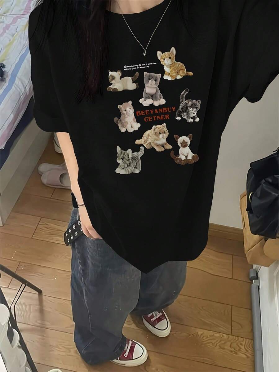 Divertida camiseta para mujer con estampado de gatos lindos diseño casual ropa cómoda para uso diario estilo juvenil y moderno color negro variado camiseta de moda en ropa de verano ideal para amantes de mascotas todas las tallas disponibles camiseta gráfica popular entre adolescentes bata básica imprescindible en el armario moda urbana. - Negro - Ver 1