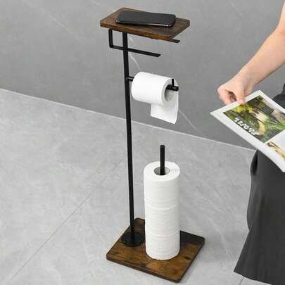 1 st golvstående toalettpappershållare med förvaringshylla - fristående rullpappershållare i järn, platsbesparande badrumsförvaringsställ, toalettpappersdispenser, lämplig för toaletter och badrum.