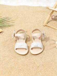 1双 Cozy Pixies 金色蝴蝶结装饰可爱公主风平底凉鞋，适合女婴和幼儿，春夏款 - 米色 - 查看 3