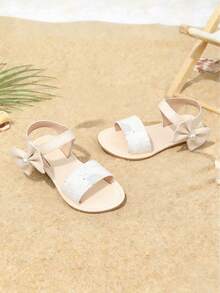 1双 Cozy Pixies 金色蝴蝶结装饰可爱公主风平底凉鞋，适合女婴和幼儿，春夏款 - 米色 - 查看 2