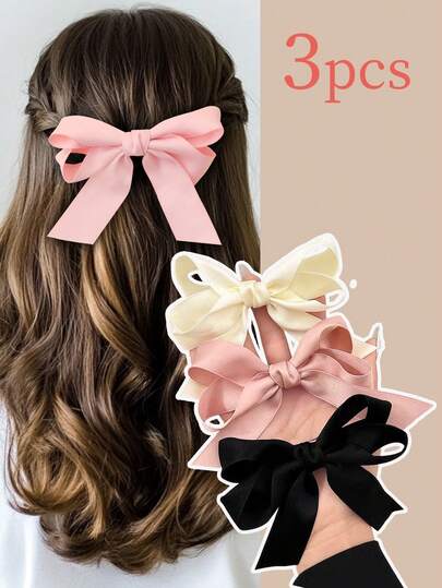 Lot de 3 pinces à cheveux style preppy avec nœud papillon, blanches, roses et noires. Barrettes à la mode en tissu, parfaites pour le quotidien et la rentrée scolaire.