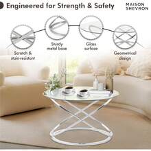 Mesa de centro redonda moderna de vidrio – tapa de vidrio templado de 26.7 pulgadas y base de pierna cruzada de color plateado chapado en cromo de lujo – Elegante mesa decorativa para sala de estar - 1 - Ver 2