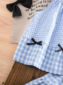 Bộ 2 món gồm áo vest không tay kẻ caro thắt nơ kiểu Pháp thanh lịch và chân váy xếp tầng cho bé gái. - Màu xanh nhạt - Xem 8