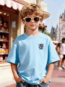 100% Cotton Short-Sleeve T-Shirt For Boys Aged 3–12, A New Summer Style Featuring A Stitch Theme! The Front Is Adorned With A Cute Mini Stitch Print, While The Back Features A Large, Stylish Hooded Stitch With Black Lettering. Stitch Is Dressed In A Brown Plaid Jacket Over A White Top And A Silver Necklace, And Waves With One Hand. The Background Is Decorated With Dark Gray "STITCH" Lettering And Lines, Creating An Eye-Catching And Playful Design. This Classic Crew Neck Pullover Is Crafted From Soft, Durable, Comfortable 100% Cotton, Offering Excellent Breathability And Sweat-Wicking Performance. It Is Available In All Kids' Sizes, Pairing Well With Wide-Leg Jeans, Cargo Shorts, Sweatpants, Or Athletic Joggers. Perfect For Various Occasions Such As Disneyland Visits, Family Outings, School, And Outdoor Parties, It Is A Fun, Versatile, And Highly Stylish Children's Top That Is Sure To Turn Heads. - Baby Blue - View 1