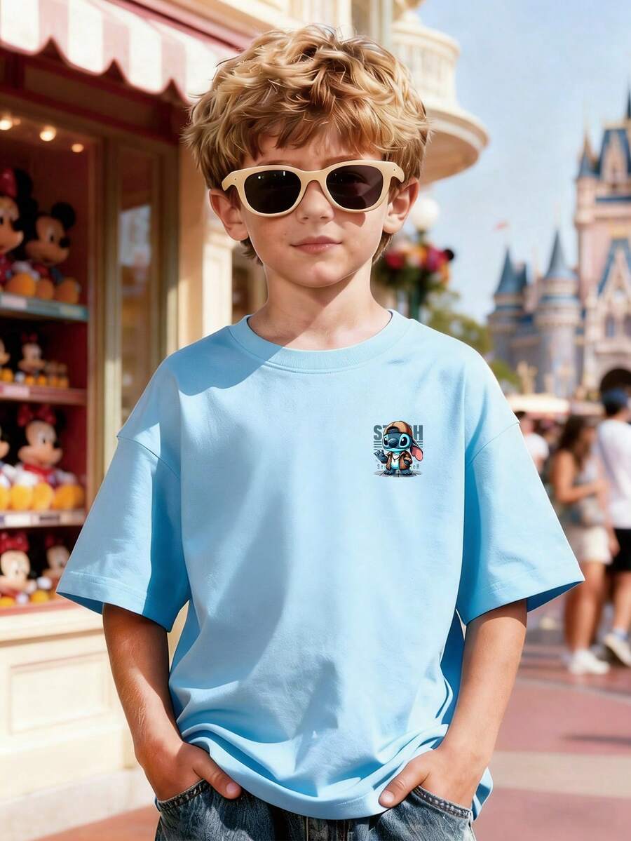 100% Cotton Short-Sleeve T-Shirt For Boys Aged 3–12, A New Summer Style Featuring A Stitch Theme! The Front Is Adorned With A Cute Mini Stitch Print, While The Back Features A Large, Stylish Hooded Stitch With Black Lettering. Stitch Is Dressed In A Brown Plaid Jacket Over A White Top And A Silver Necklace, And Waves With One Hand. The Background Is Decorated With Dark Gray "STITCH" Lettering And Lines, Creating An Eye-Catching And Playful Design. This Classic Crew Neck Pullover Is Crafted From Soft, Durable, Comfortable 100% Cotton, Offering Excellent Breathability And Sweat-Wicking Performance. It Is Available In All Kids' Sizes, Pairing Well With Wide-Leg Jeans, Cargo Shorts, Sweatpants, Or Athletic Joggers. Perfect For Various Occasions Such As Disneyland Visits, Family Outings, School, And Outdoor Parties, It Is A Fun, Versatile, And Highly Stylish Children's Top That Is Sure To Turn Heads. - Baby Blue - View 1