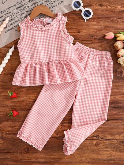 女婴两件套服装，包括无袖荷叶边上衣和松紧腰裤，幼儿两件套服装