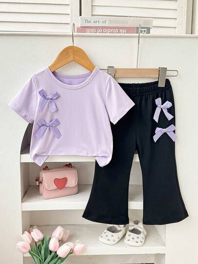 女婴夏季短袖上衣和喇叭裤两件套 - 蝴蝶结装饰 - 甜美风格 - 舒适透气面料 - 修身版型