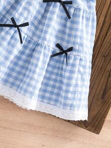 Bộ 2 món gồm áo vest không tay kẻ caro thắt nơ kiểu Pháp thanh lịch và chân váy xếp tầng cho bé gái. - Màu xanh nhạt - Xem 7