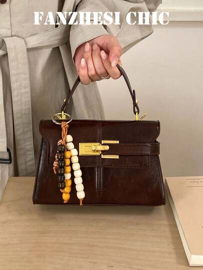 This Stylish And Classic Solid-Color PU Waterproof Bag Features An Independent Handle, A Flap Closure, And A Decorative Pendant. It's An Elegant Small Handbag Perfect For Travel, Shopping, And Parties.